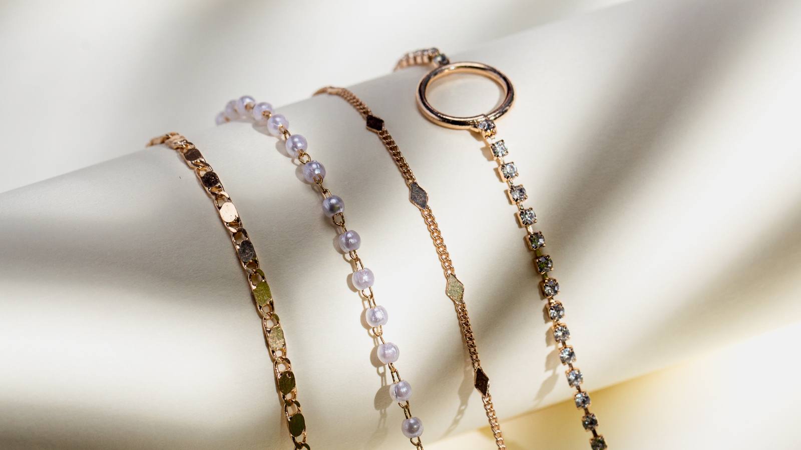 Peoples Jewellers logo