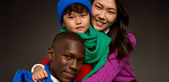 3 kids posing together in Polo Ralph Lauren attire