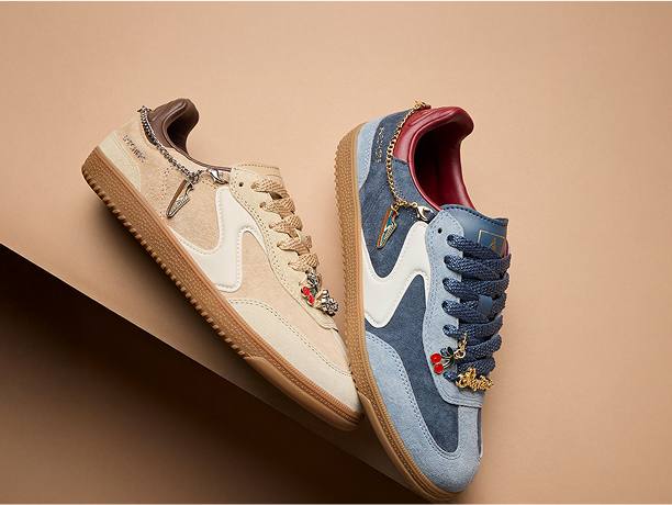 A woman modeling Under Armour clothing